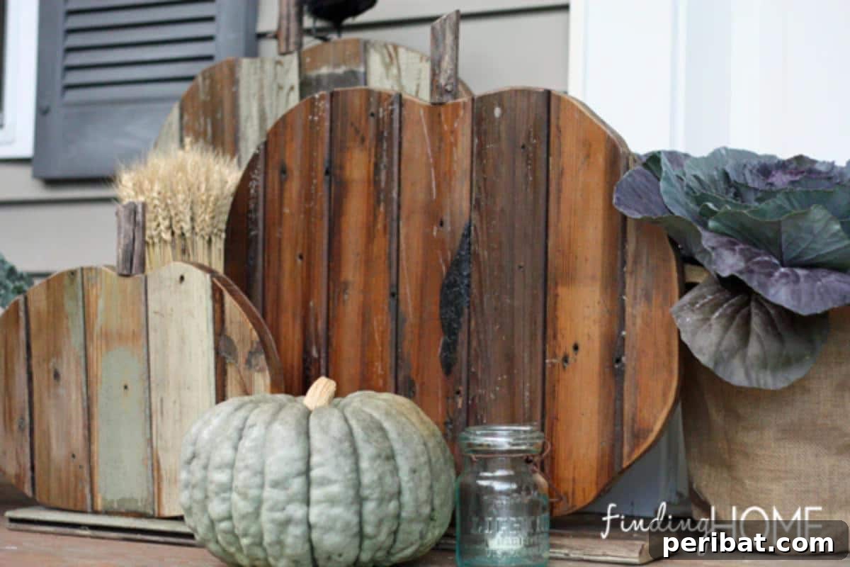 Simple Wooden Pumpkin Crafts for Autumn Decor 4 Stacked DIY reclaimed wood pumpkins with natural textures.
