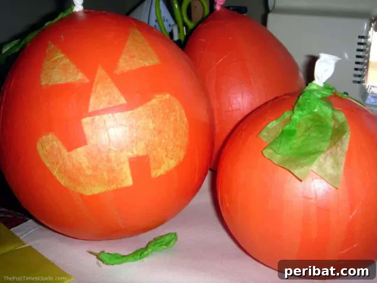 33 Creative Paper Mache Pumpkin Ideas 13 A vibrant collection of easy DIY paper mache pumpkins, perfect for kids and safe alternatives to carving.