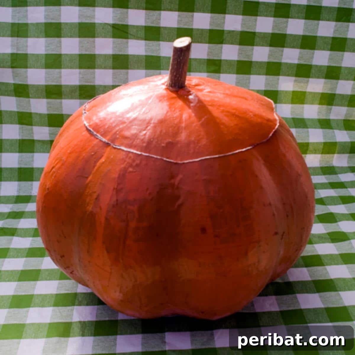 33 Creative Paper Mache Pumpkin Ideas 3 Crafting a DIY Papier Mache Pumpkin, showcasing the simple yet versatile process for autumn decorations.