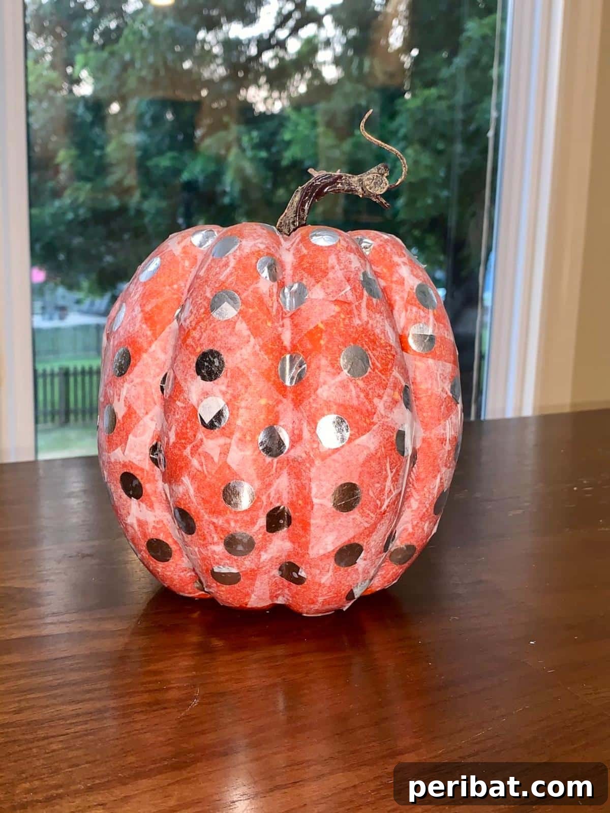 33 Creative Paper Mache Pumpkin Ideas 21 Vibrantly colored Tissue Paper Paper Mache Pumpkins, perfect for a quick and impactful Halloween or fall decor update.