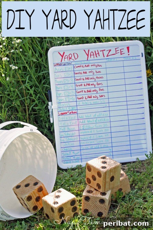 Giant Yard Yahtzee game with wooden dice and metal buckets
