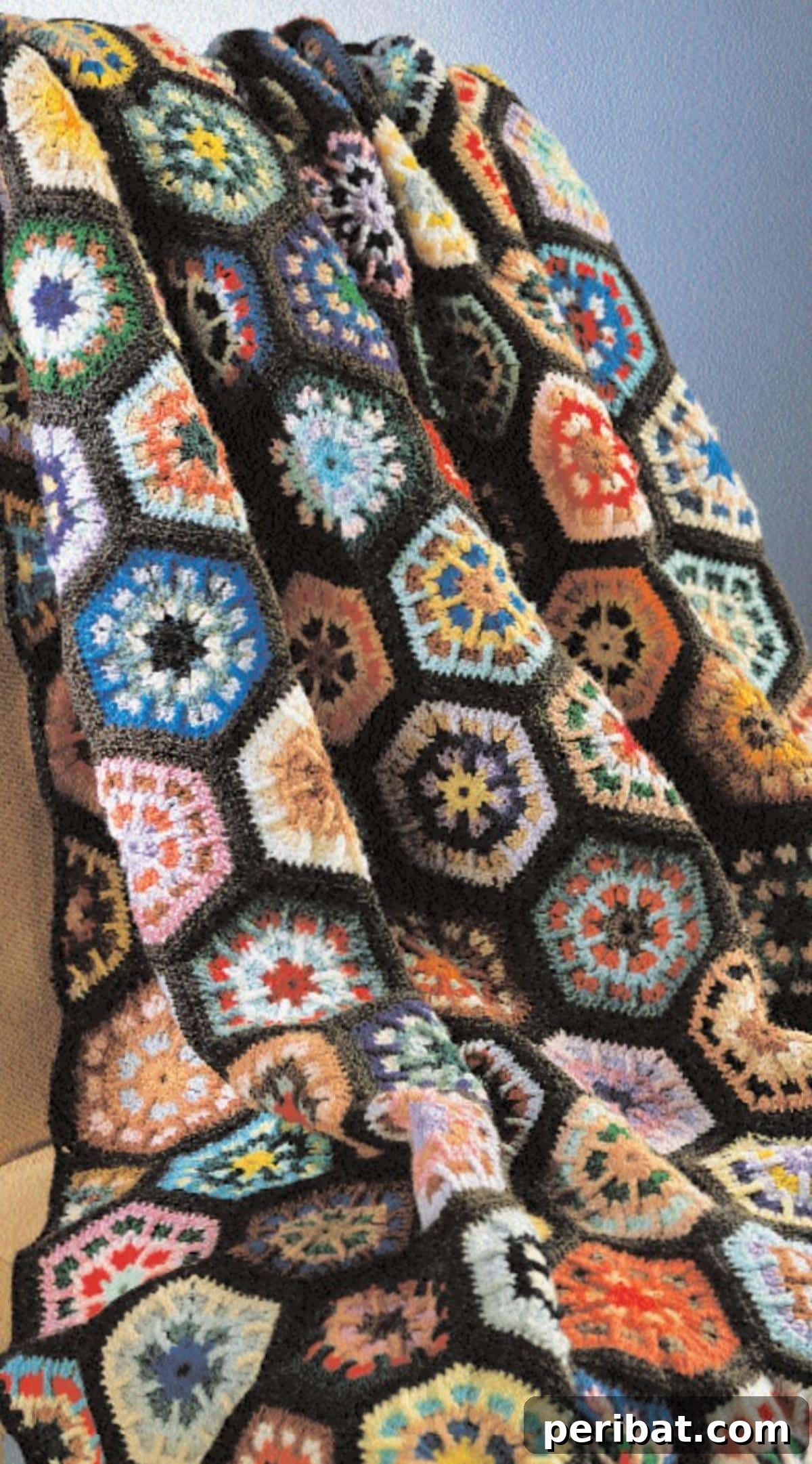 28 Soothing DIY Weighted Blanket Projects 21 A stunning Kaleidoscope Weighted Blanket, featuring a mesmerizing array of colors and intricate patterns for a vibrant look.