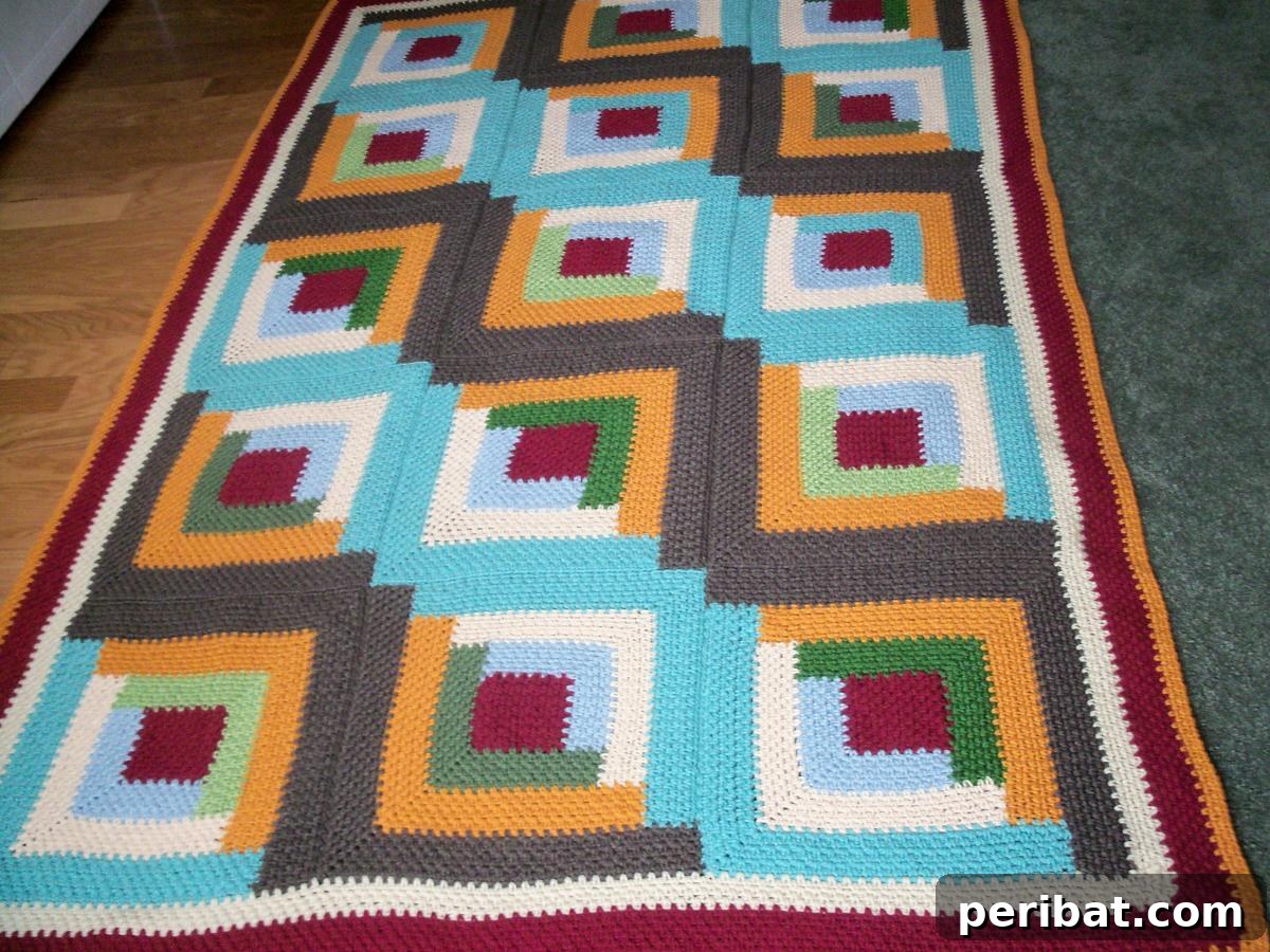 28 Soothing DIY Weighted Blanket Projects 22 A classic Day Log Cabin Afghan Weighted Blanket, showcasing the traditional log cabin quilt block design with added weight.