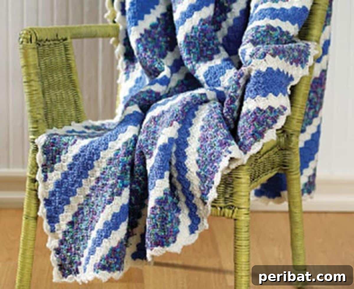 28 Soothing DIY Weighted Blanket Projects 24 A colorful Corner-to-Corner Afghan Weighted Blanket, illustrating the diagonal construction method.