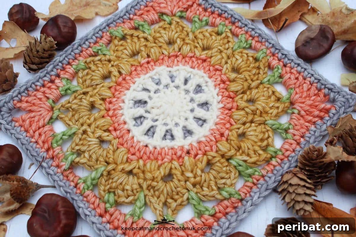 An Autumn Turn Afghan Block Granny Square, featuring warm, earthy tones and a leaf-like pattern.