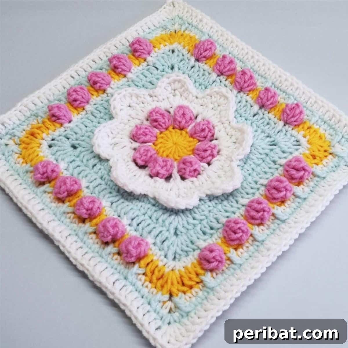 A vibrant Floral Afghan Block Crochet Motif, designed for springtime projects.