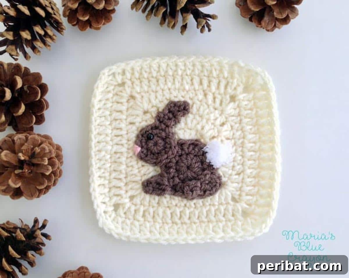 An adorable Crochet Bunny Rabbit Applique Granny Square, perfect for baby items and children's decor.