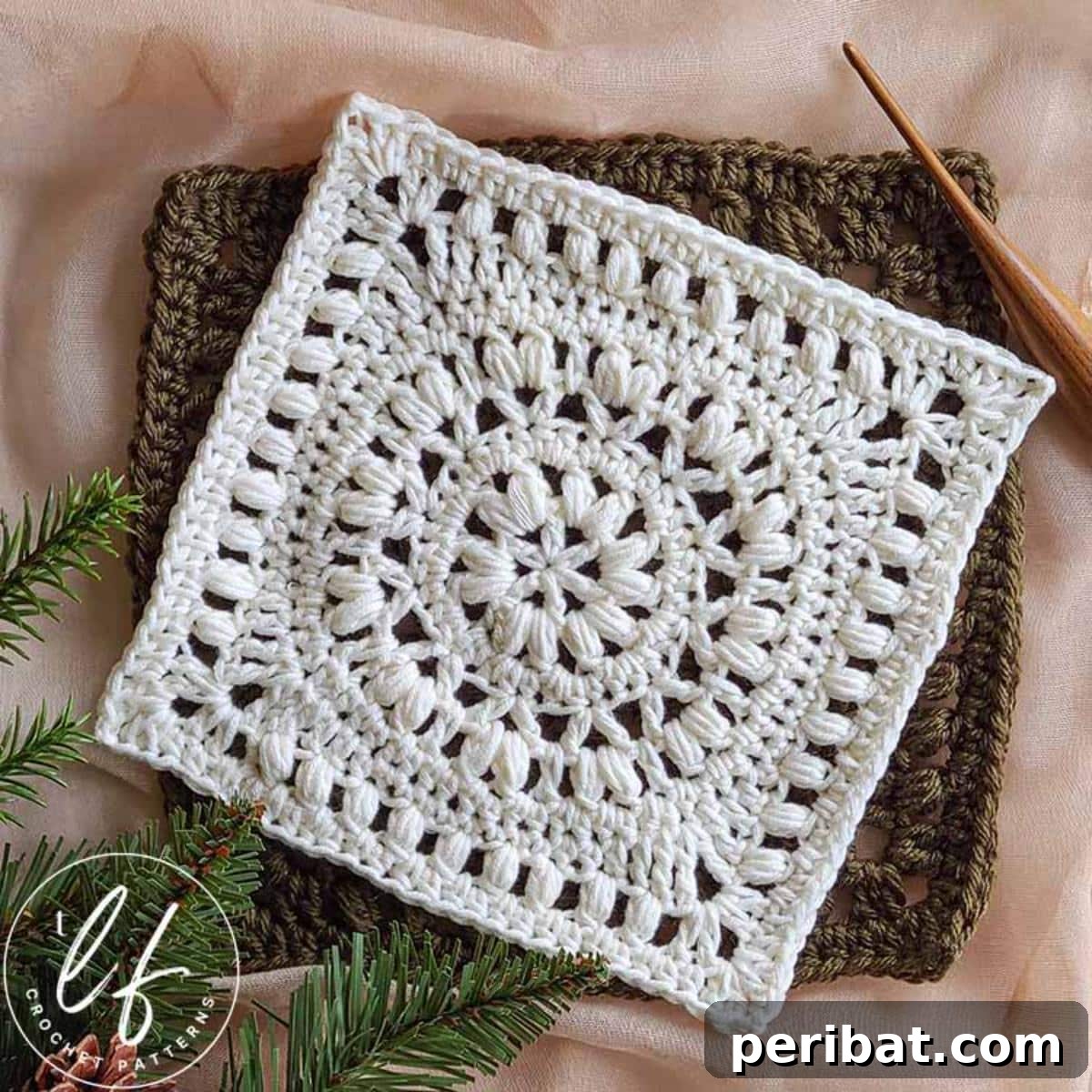 Marguerite’s Square Crochet Afghan Pattern, featuring elegant white floral motifs.