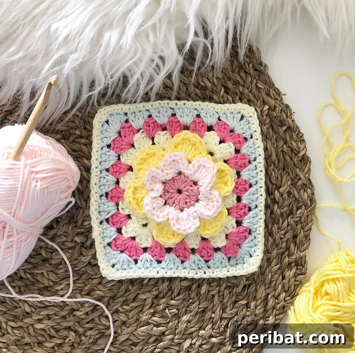 A vibrant Flower Power Granny Square, featuring multiple layered and intricate floral motifs.