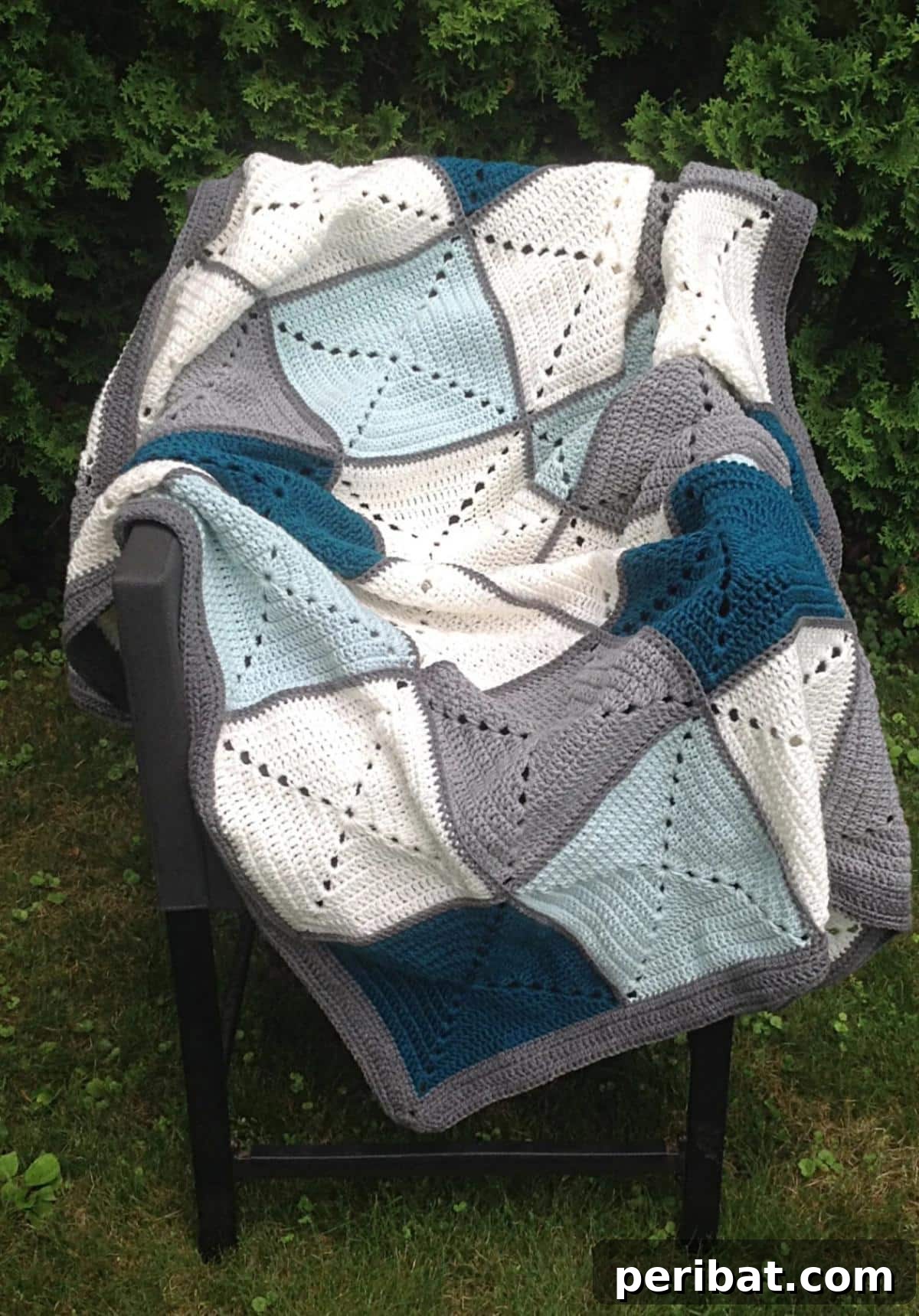 A beautifully assembled Basic Granny Square Blanket, showcasing classic granny squares joined together.