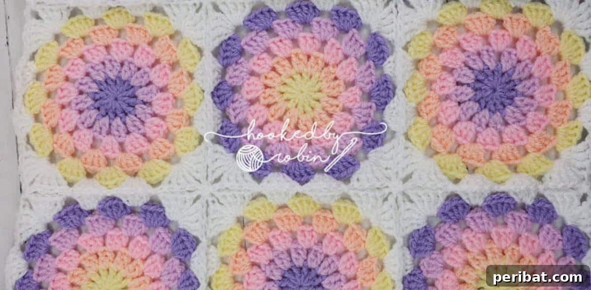 A delicate Crochet Pastel Circle in a Square Motif, showcasing soft, harmonious colors.
