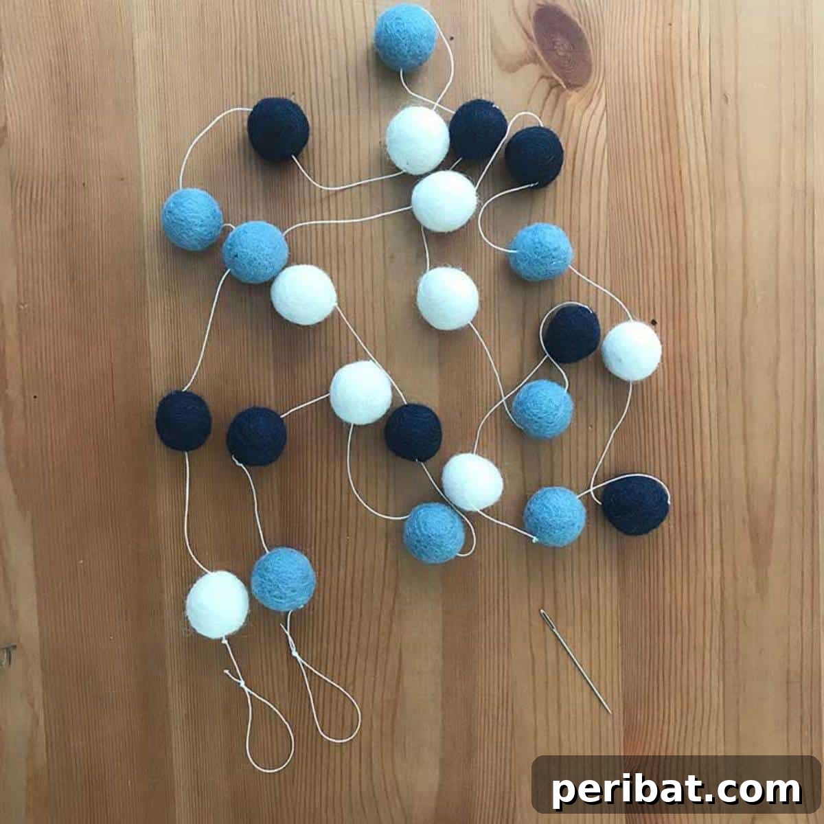 30 Creative Felt Garland DIY Ideas 8 Felt Ball Garland
