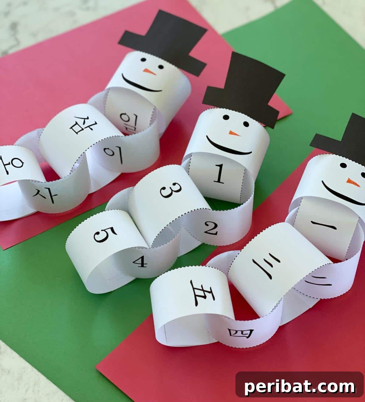 Craft Your Way to Christmas: 30 Paper Chain Countdown Projects 14 An educational tri-lingual paper chain snowman for a diverse Christmas countdown.