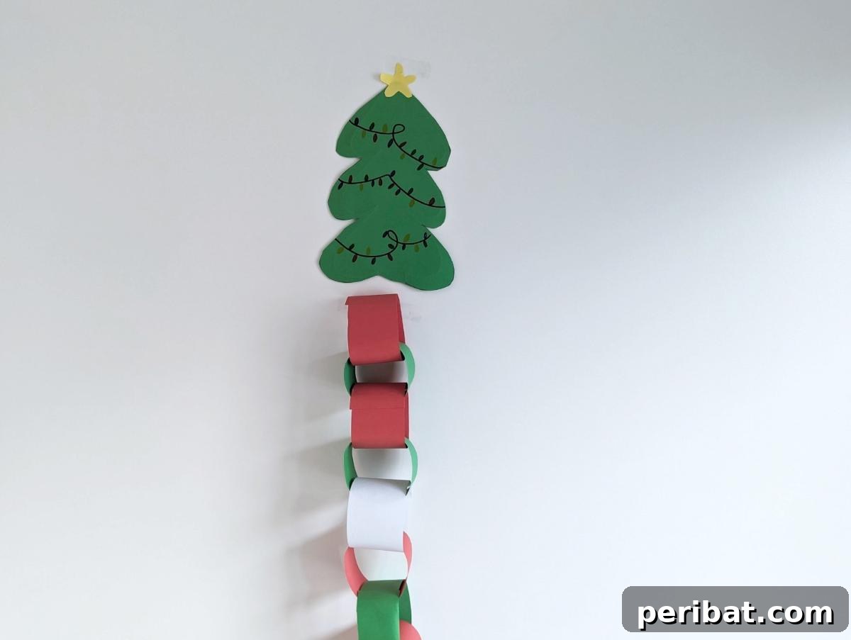 Craft Your Way to Christmas: 30 Paper Chain Countdown Projects 15 A charming homemade paper chain providing a visual Christmas countdown for children.