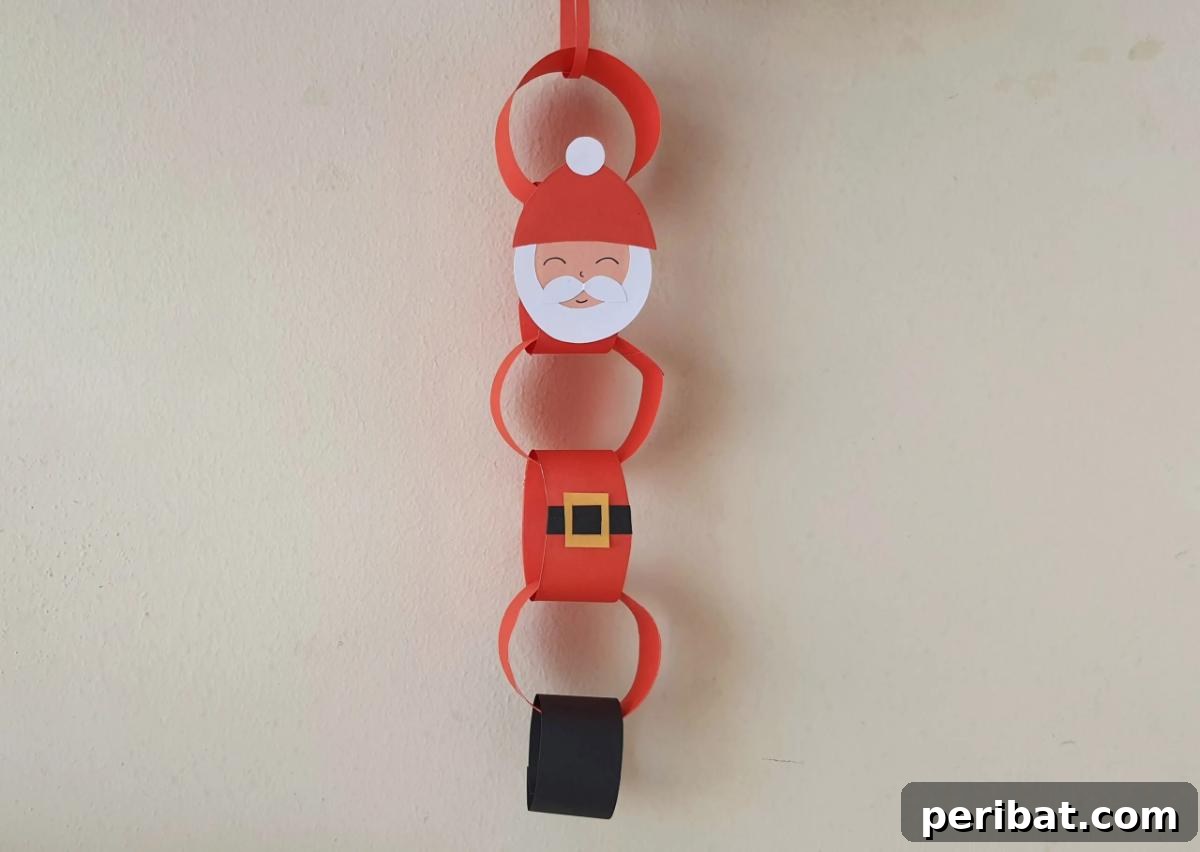 Craft Your Way to Christmas: 30 Paper Chain Countdown Projects 22 A customizable Christmas countdown chain craft allowing personal touches.