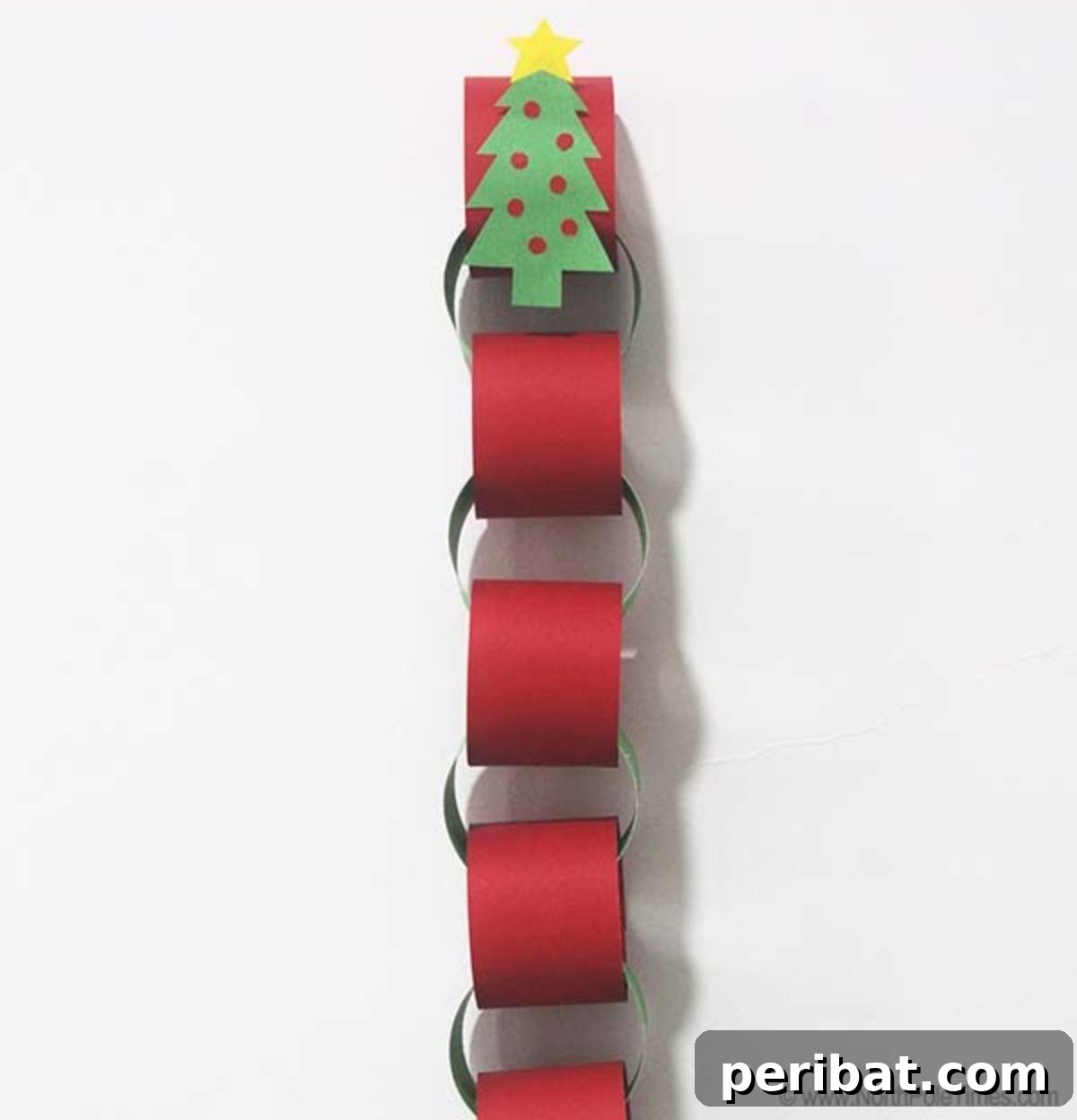 Craft Your Way to Christmas: 30 Paper Chain Countdown Projects 4 A colorful paper chain serving as a simple Christmas countdown decoration.