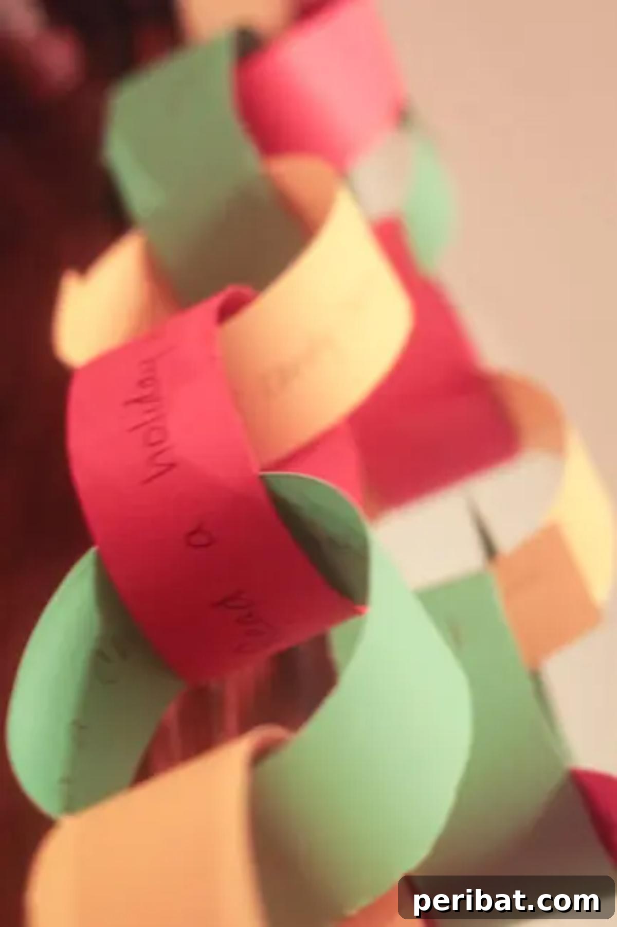 Craft Your Way to Christmas: 30 Paper Chain Countdown Projects 5 A classic design of a festive Christmas countdown chain for daily surprises.