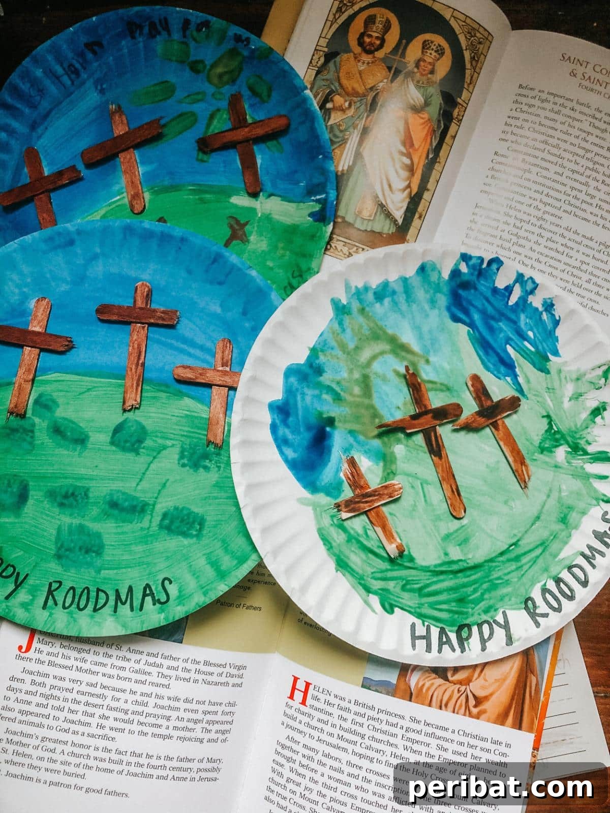 Craft commemorating the Feast of the Exaltation of the Cross made with paper plates and popsicle sticks.