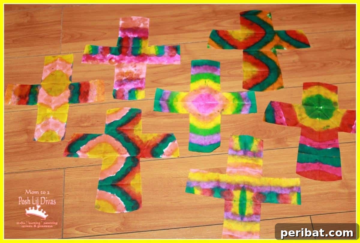 Kids' tie-dye Easter cross art made on coffee filters with markers.