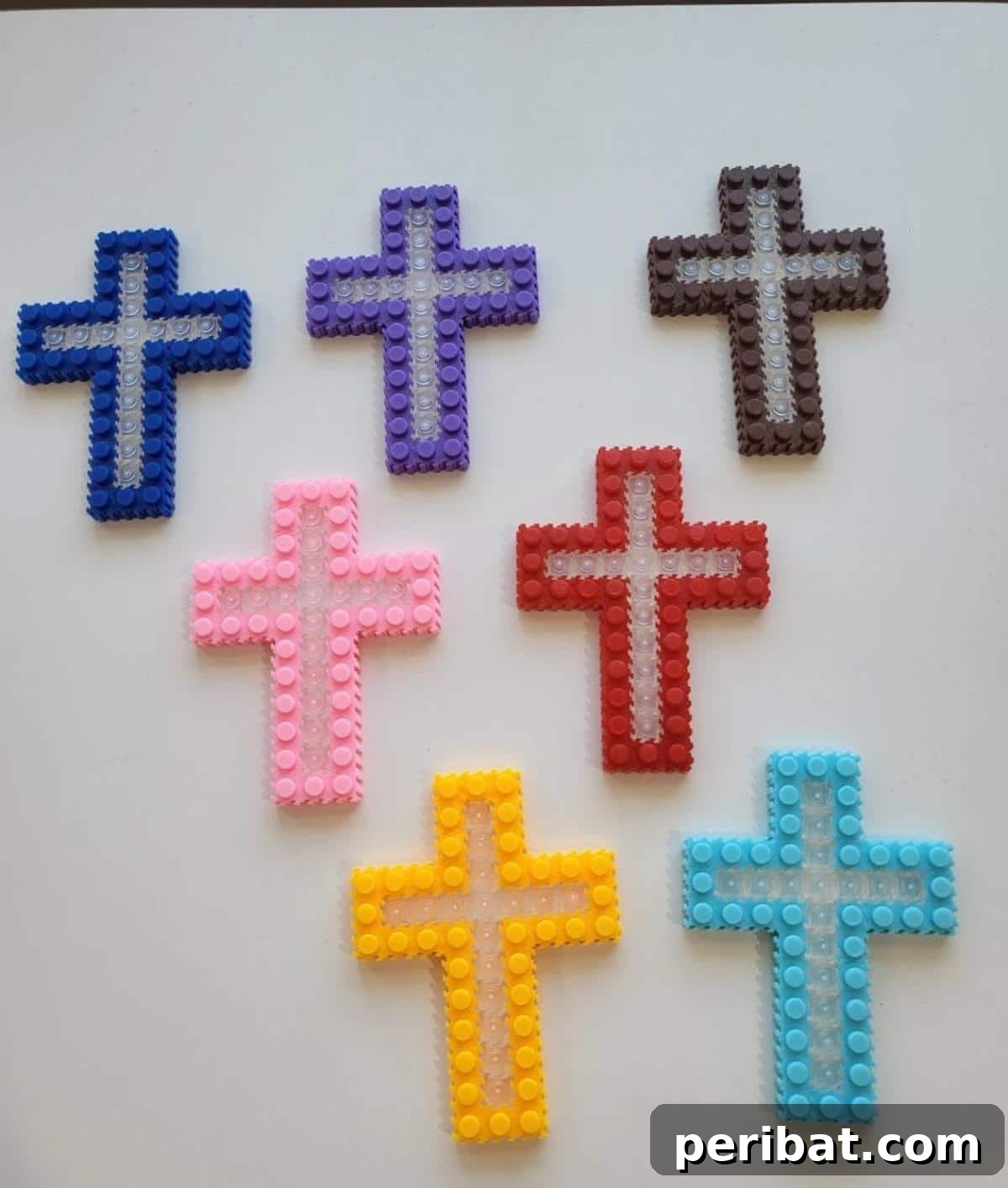 DIY cross pixel mini-block kits for assembling detailed, colorful crosses.
