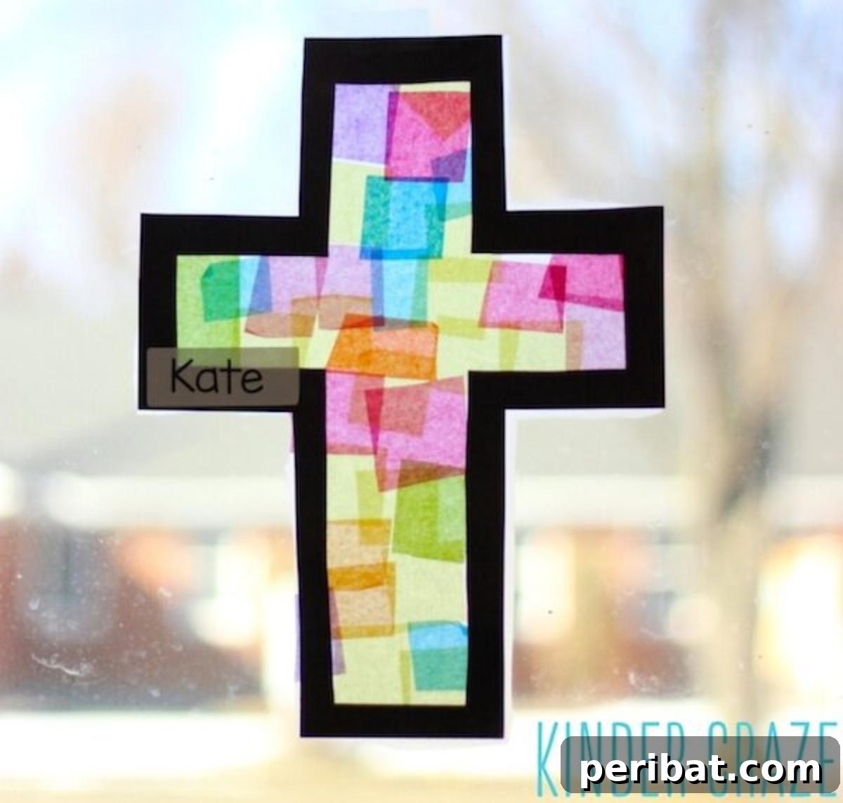 Stained glass cross lantern craft made with tissue paper for kindergarteners.