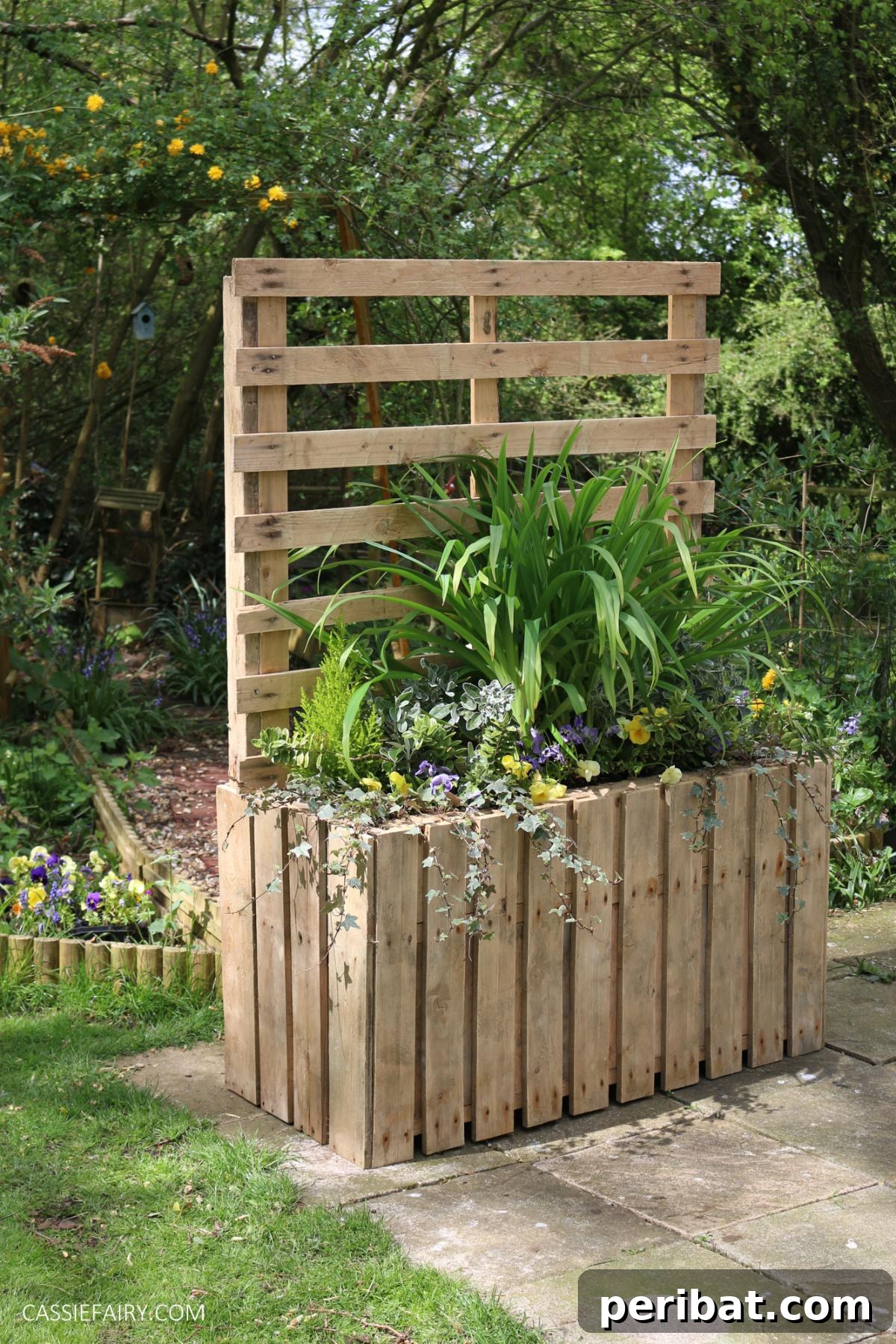 From Pallets to Paradise 40 Garden Furniture and Decor DIYs 26 Upcycled Pallet Planter and Patio Privacy Screen