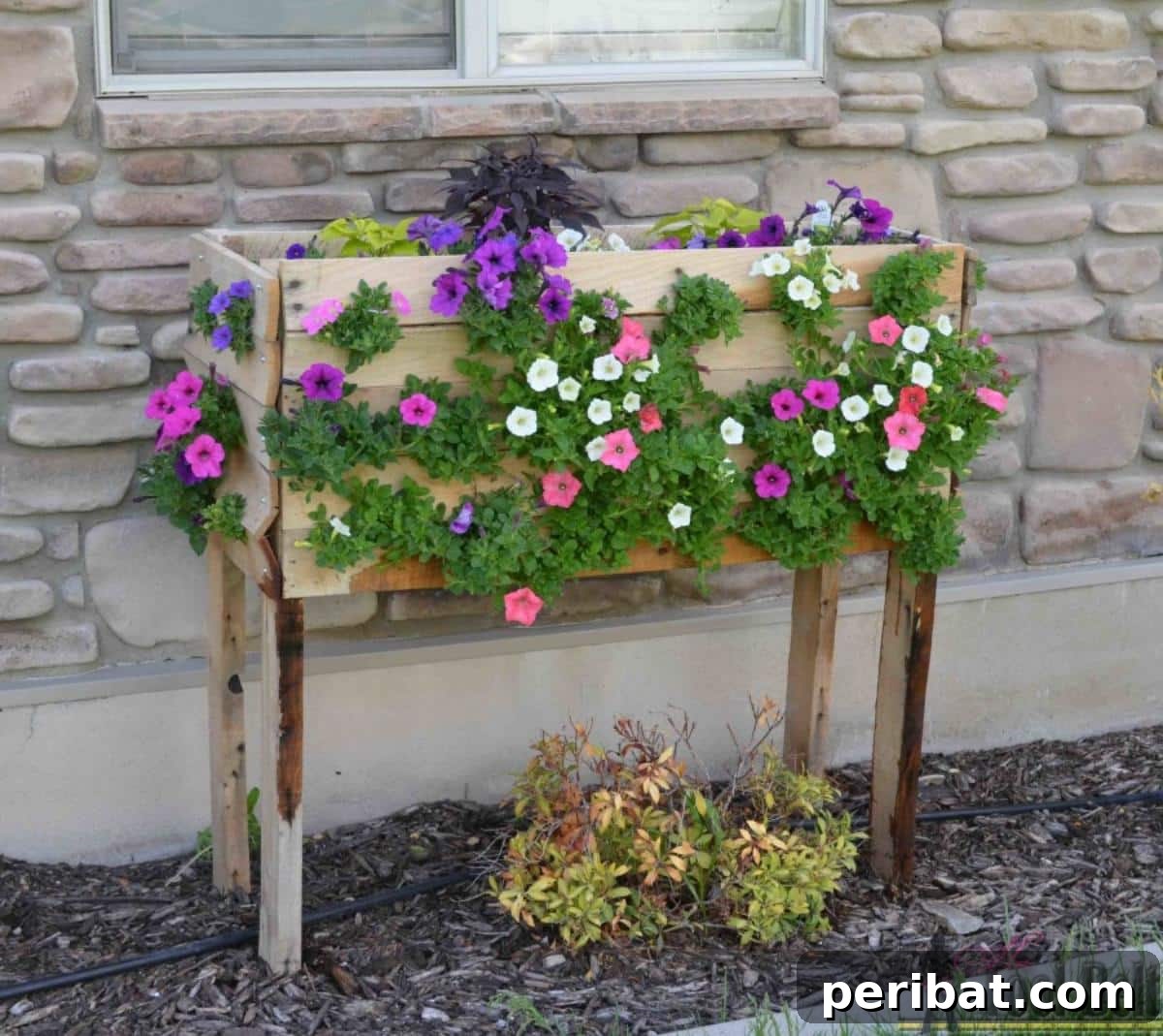 From Pallets to Paradise 40 Garden Furniture and Decor DIYs 27 Pallet Planter Box for Cascading Flowers