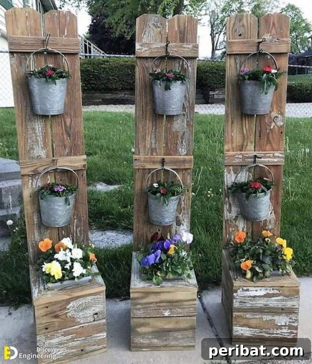 From Pallets to Paradise 40 Garden Furniture and Decor DIYs 8 DIY Wooden Pallet Garden Decor Stand