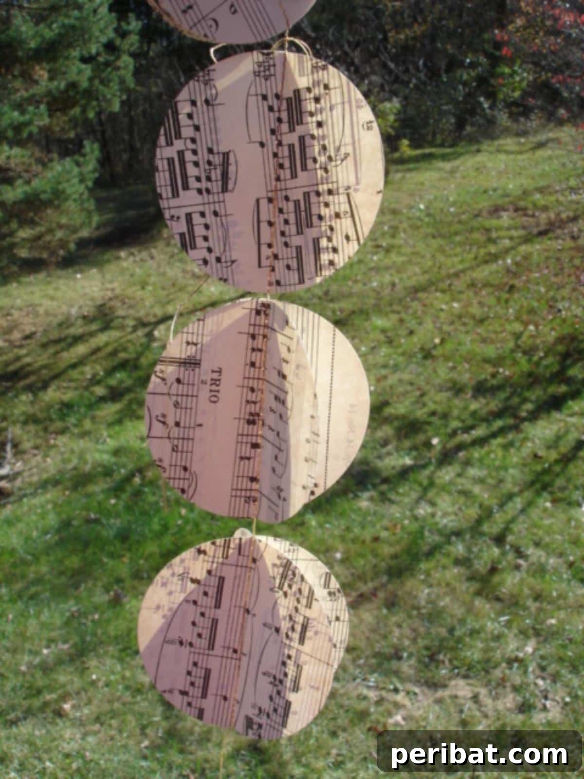 Crafting Melodies 40 Sheet Music Projects 20 A decorative sheet music garland, featuring circles of musical paper strung together.