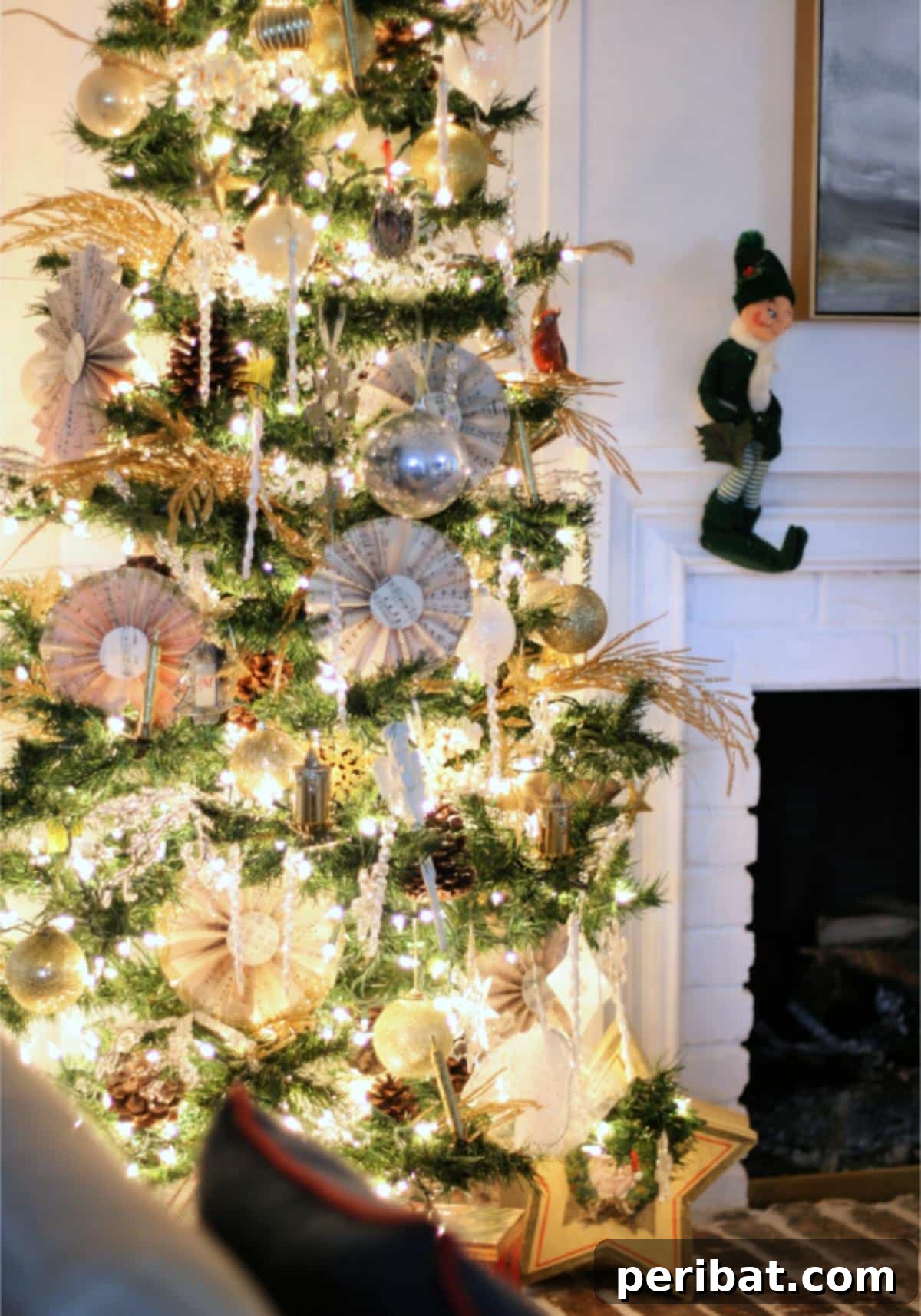 Crafting Melodies 40 Sheet Music Projects 35 A beautifully crafted DIY Christmas paper fan made from vintage sheet music, perfect for festive decor.