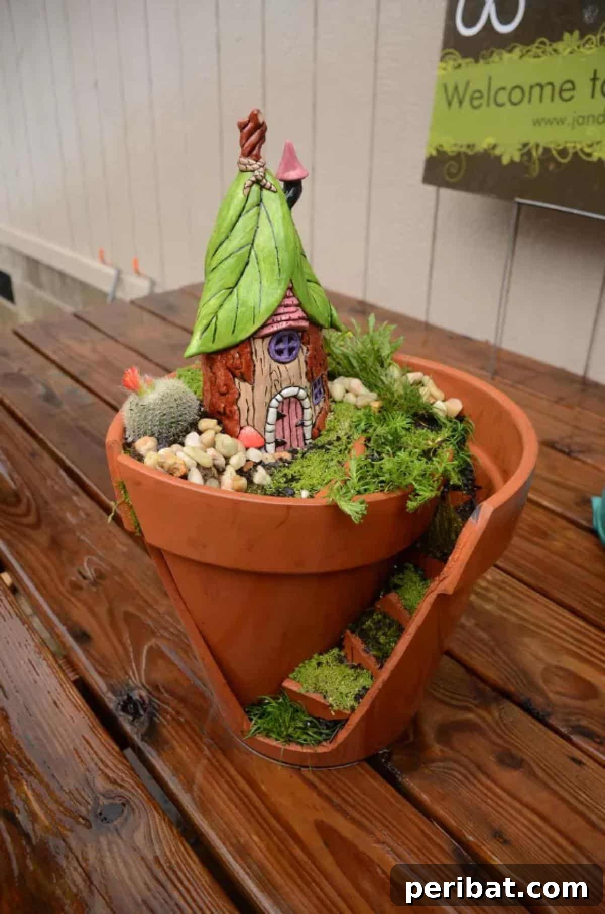 40 Creative Flower Pot Projects 19 An enchanting broken pot fairy garden, creating a magical miniature landscape with repurposed terracotta pieces.