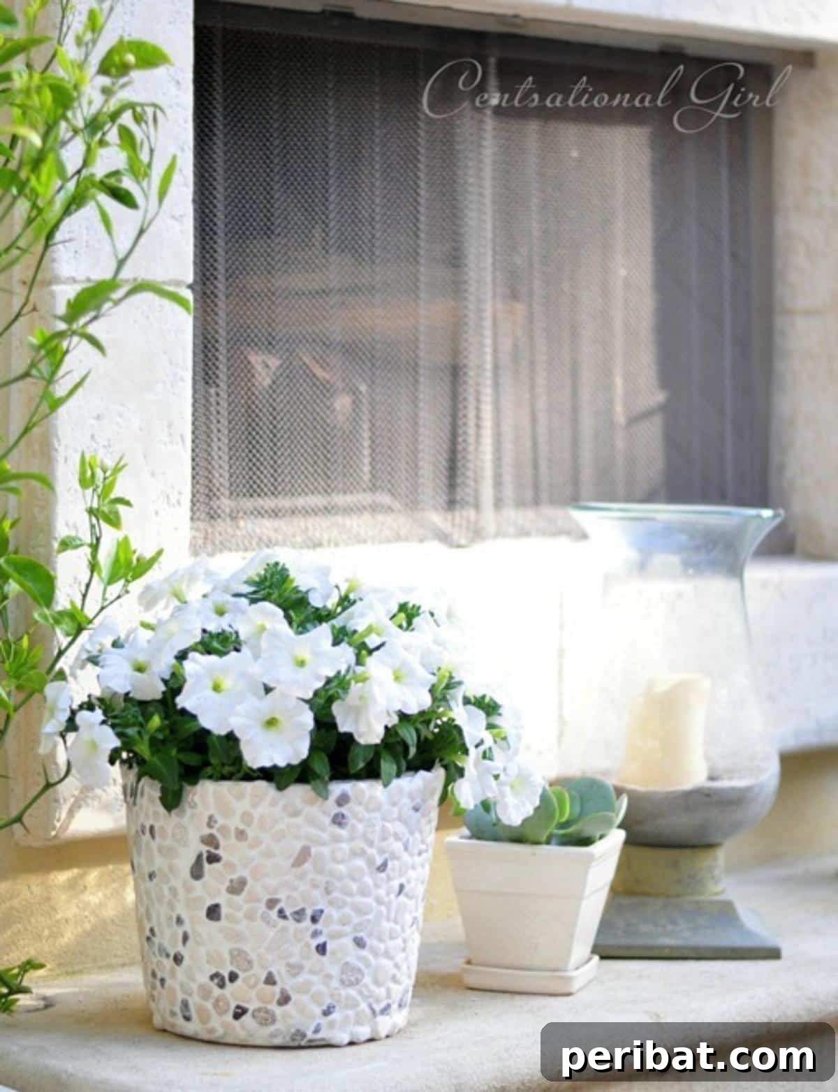 40 Creative Flower Pot Projects 21 A unique DIY rock-covered bucket or pot, creating a durable and natural planter for outdoor spaces.
