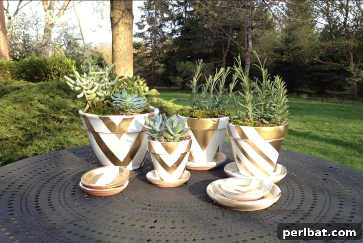 40 Creative Flower Pot Projects 28 Sleek DIY metallic graphic pots, offering a modern and chic aesthetic for contemporary home and garden decor.