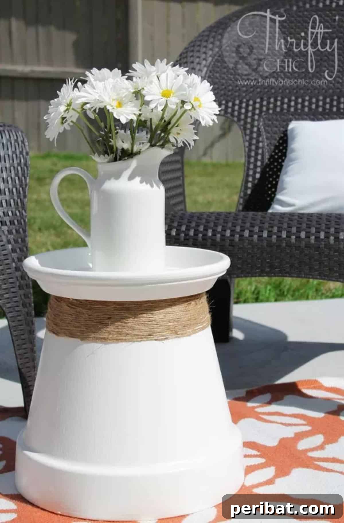 40 Creative Flower Pot Projects 32 A creative repurposed terracotta pot transformed into a stylish accent table for garden or patio.