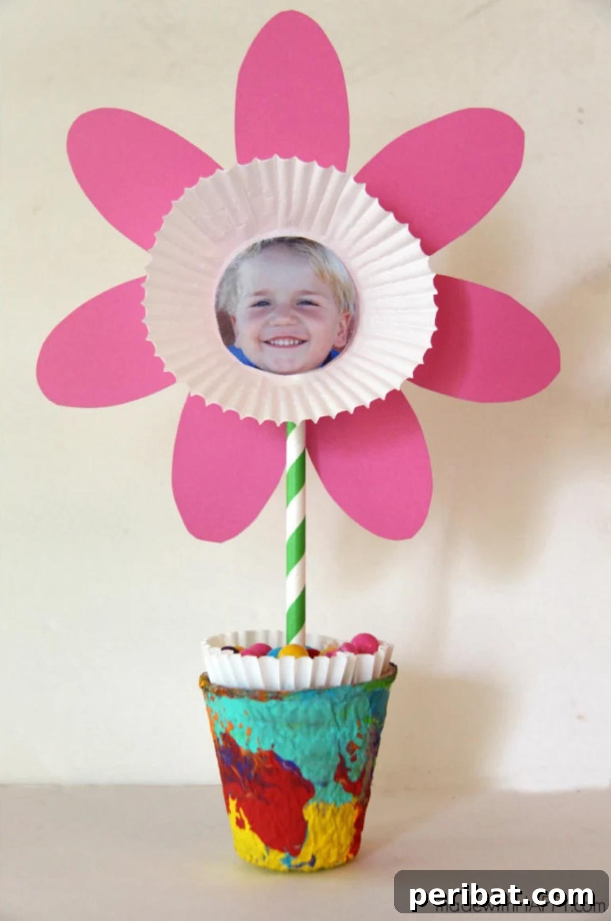 40 Creative Flower Pot Projects 39 A sentimental photo flower craft, displaying cherished memories on flower stems to create a personalized bouquet.