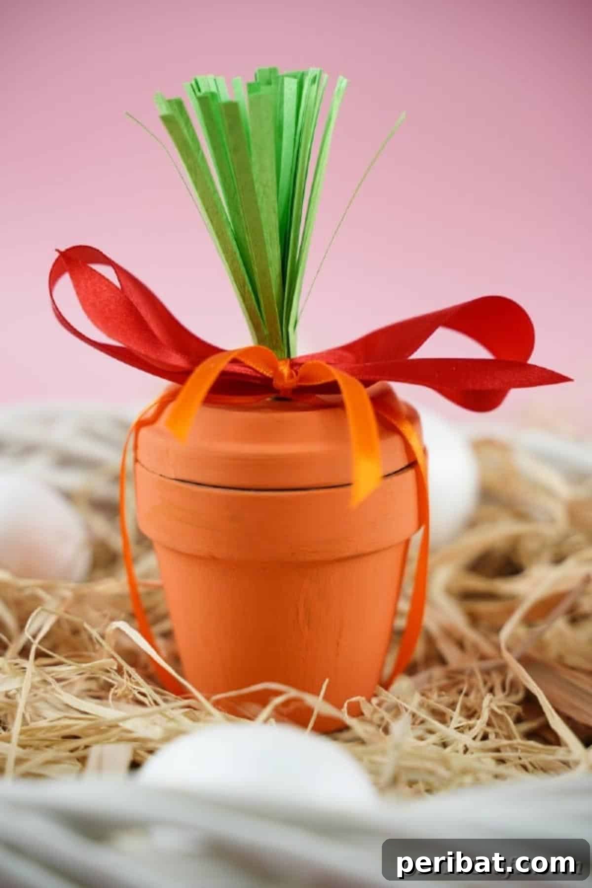 40 Creative Flower Pot Projects 6 A creative DIY flower pot carrot decoration, perfect for adding a festive touch to Easter celebrations.