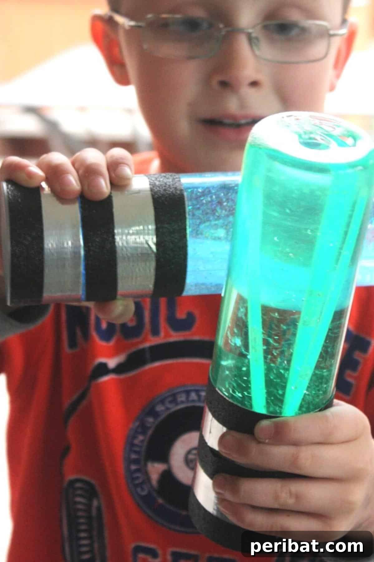 Colorful lightsaber sensory bottles, glowing with glitter and liquid, suitable for calming or play.