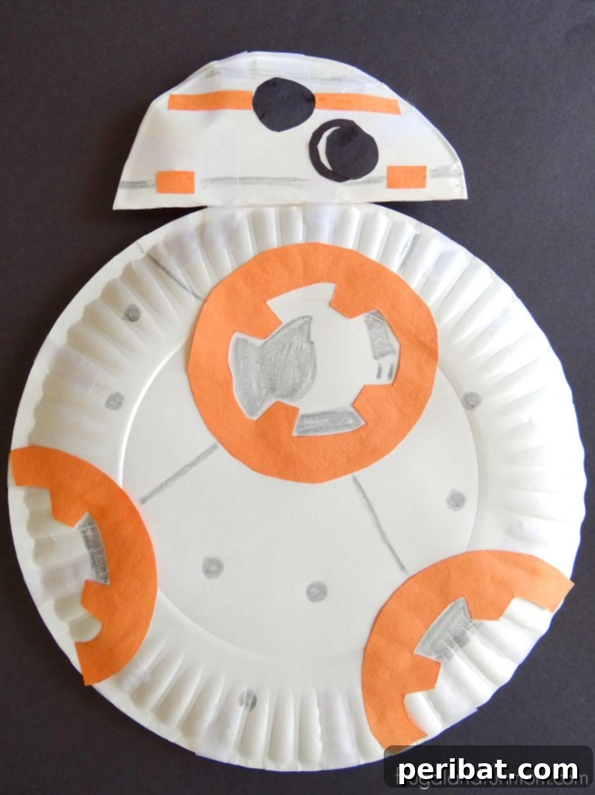 A BB-8 droid craft made from paper plates, with orange and gray details replicating the character.