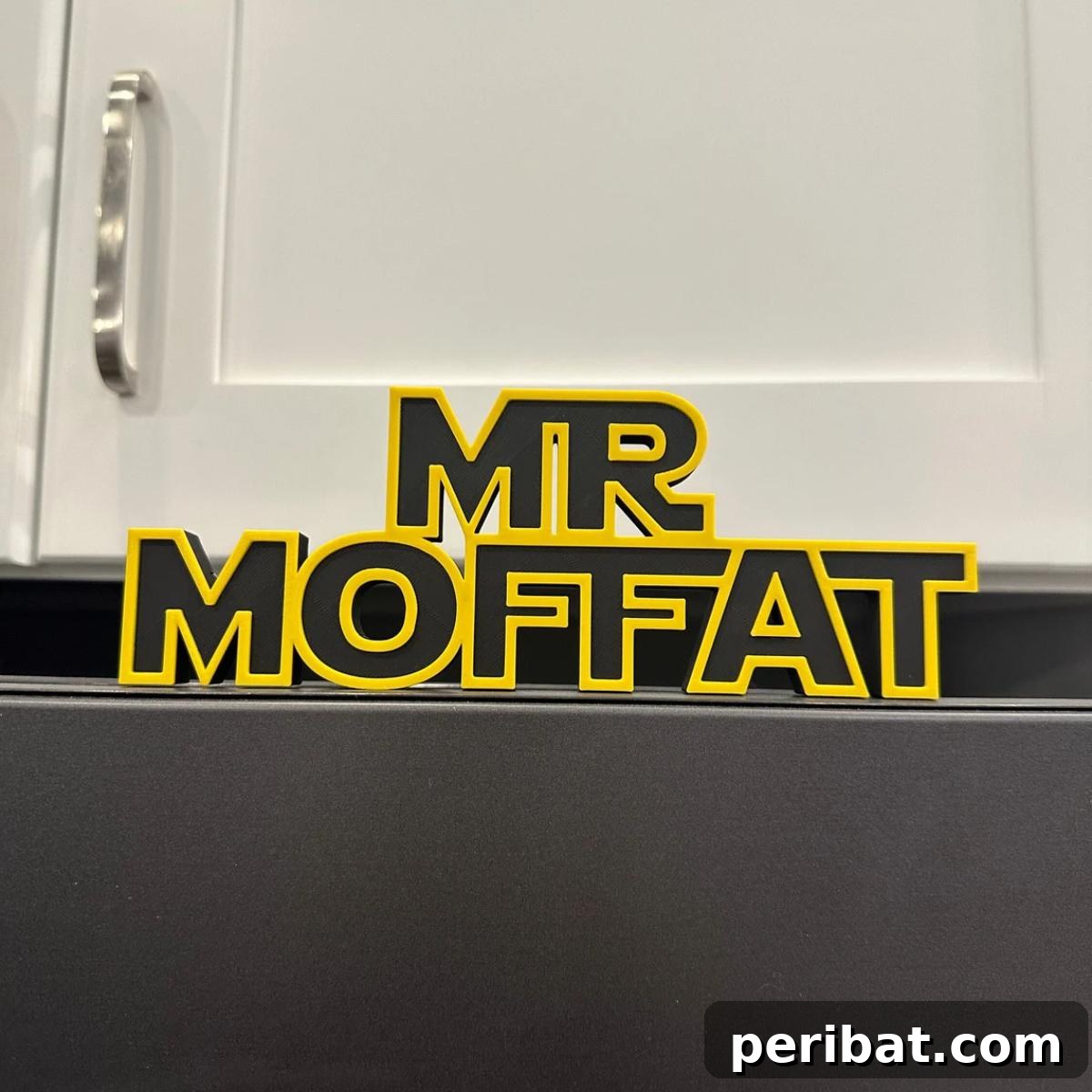 A 3D printed custom name plate in a Star Wars font and style, perfect for personalizing a room or desk.