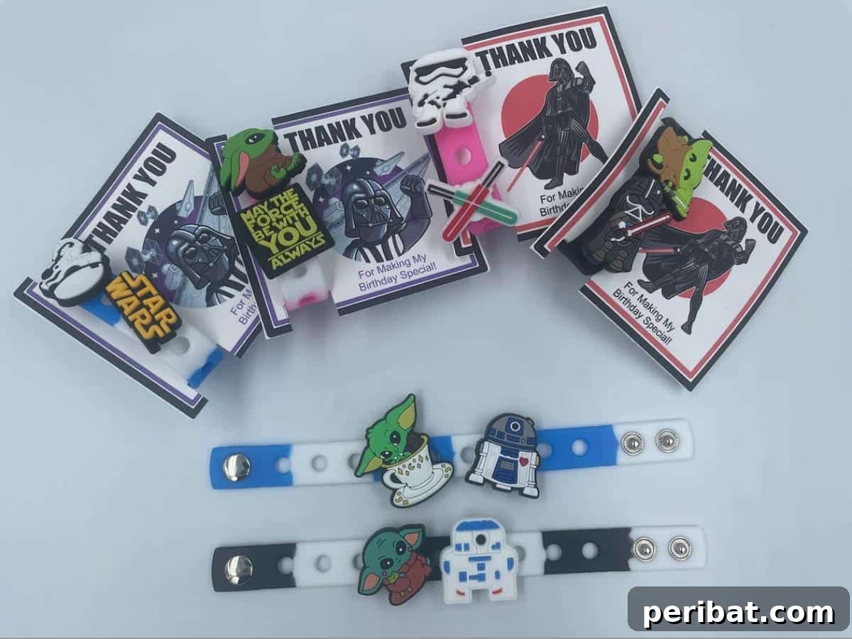 Star Wars themed bracelets or charms as party favors, featuring characters like Yoda.