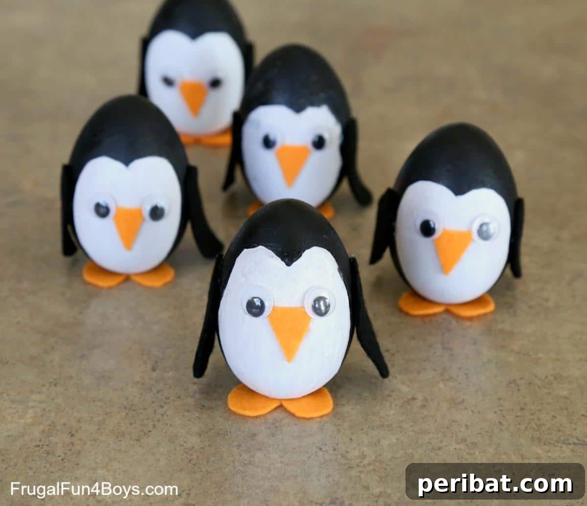 Waddle into Fun: 40 Penguin Craft Projects 27 Wooden Egg Penguin Craft, transforming wooden eggs into charming penguin figures.