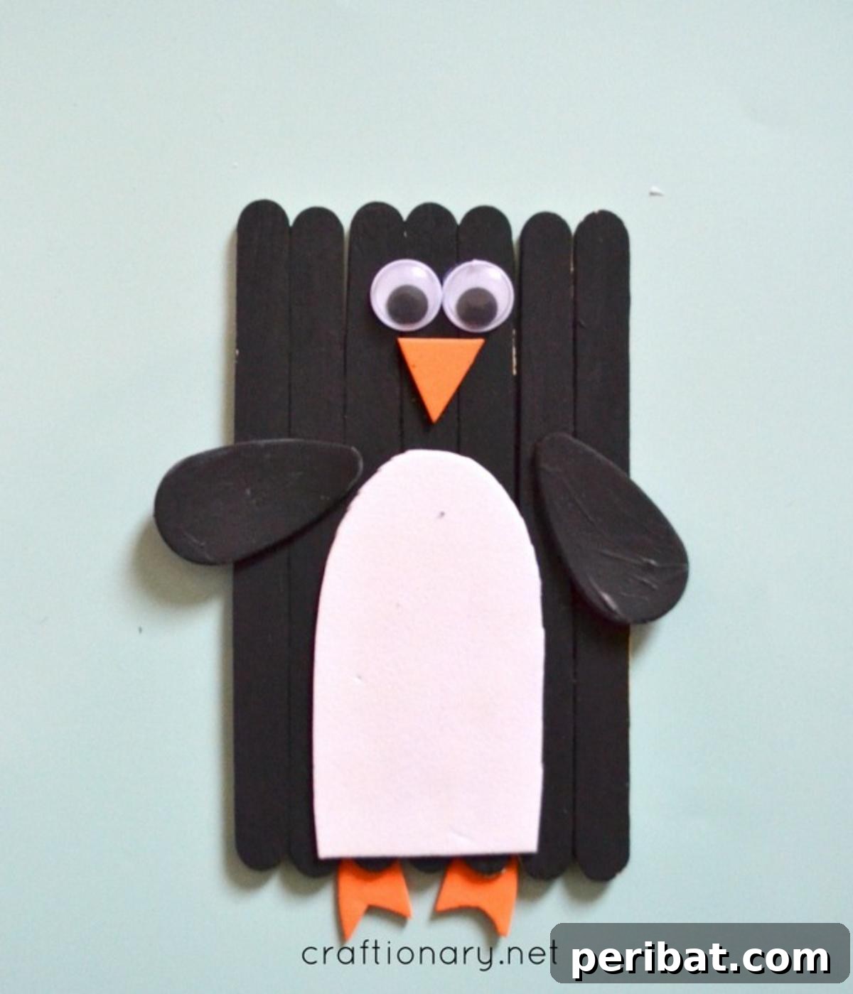 Waddle into Fun: 40 Penguin Craft Projects 28 Popsicle Stick Penguin Craft, creating charming penguin figures with popsicle sticks.
