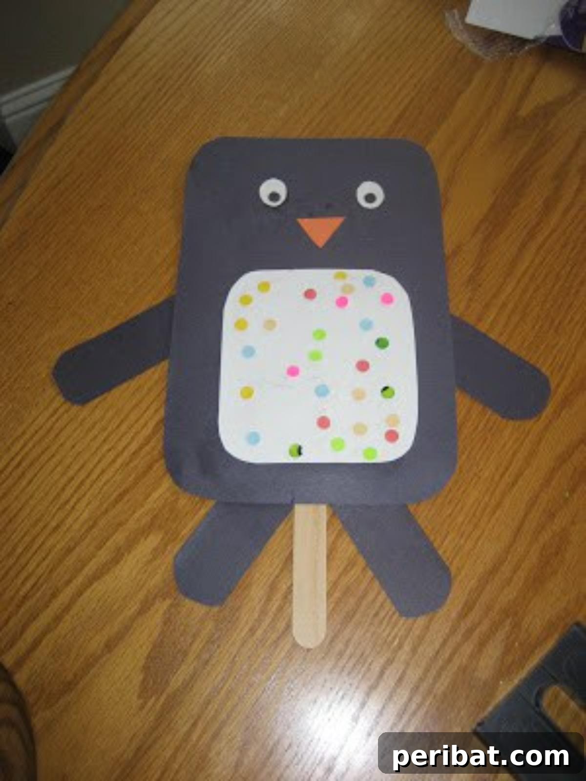 Waddle into Fun: 40 Penguin Craft Projects 34 Penguin Puppet, a fun way to animate storytelling for kids.