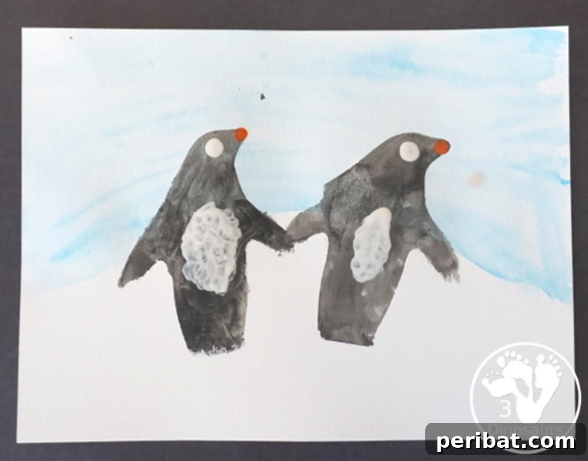 Waddle into Fun: 40 Penguin Craft Projects 35 Penguin Watercolor Painting, a charming penguin scene painted with watercolors.