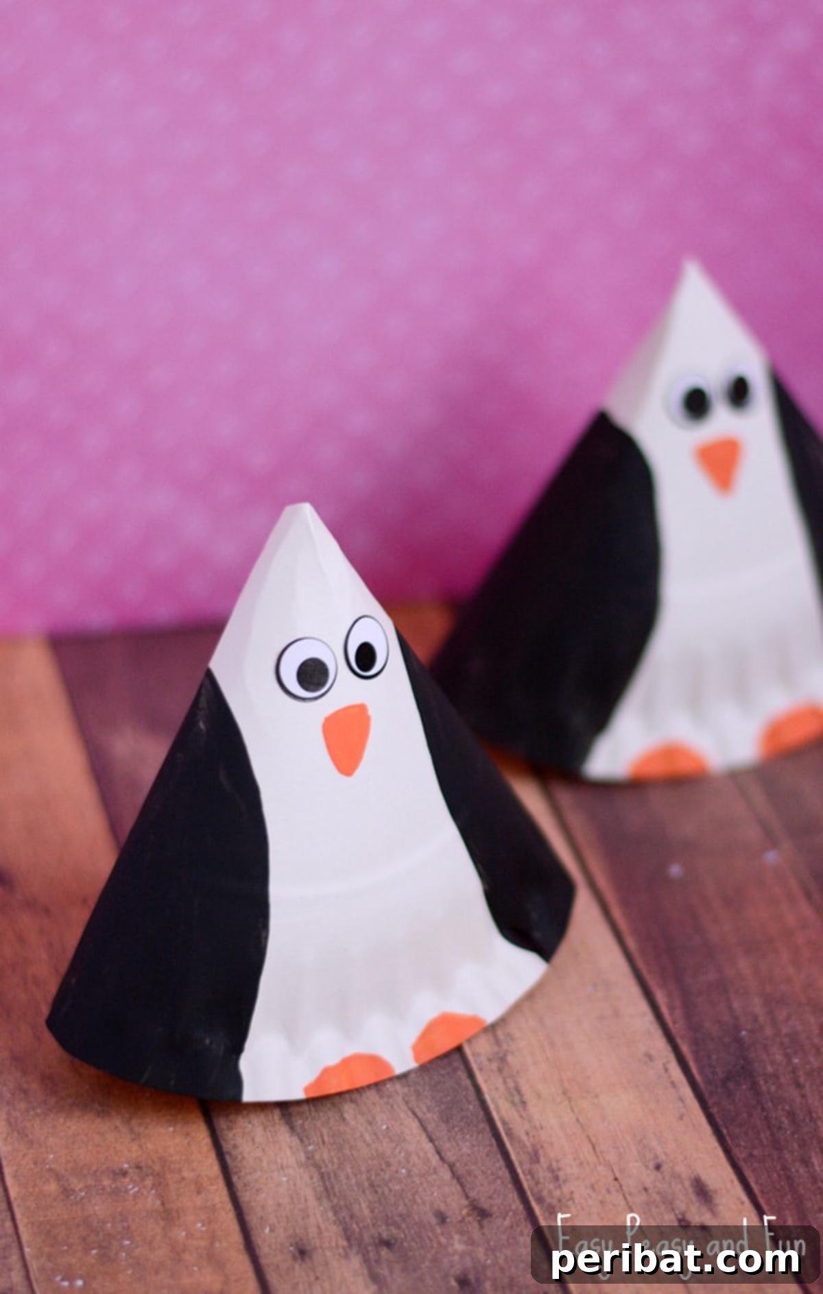 Waddle into Fun: 40 Penguin Craft Projects 8 Rocking Paper Plate Penguin Craft, a fun and wobbly art project for children.