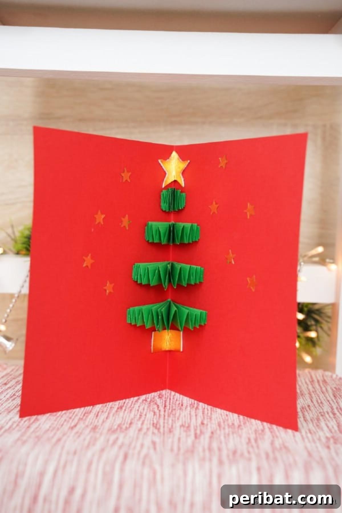 40 Colorful Construction Paper Creations 30 Festive 3D Christmas tree cards, showing miniature green paper trees that pop up when opened, adorned with tiny colorful decorations.