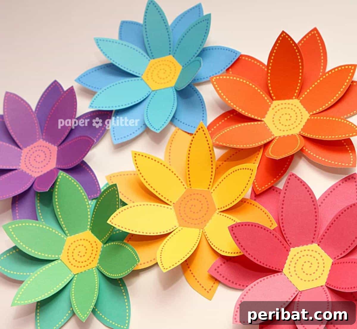 40 Colorful Construction Paper Creations 40 A vibrant Paper Flowers Rainbow Paper Craft Set, showcasing an array of colorful paper flowers arranged in a rainbow spectrum, ready for assembly.