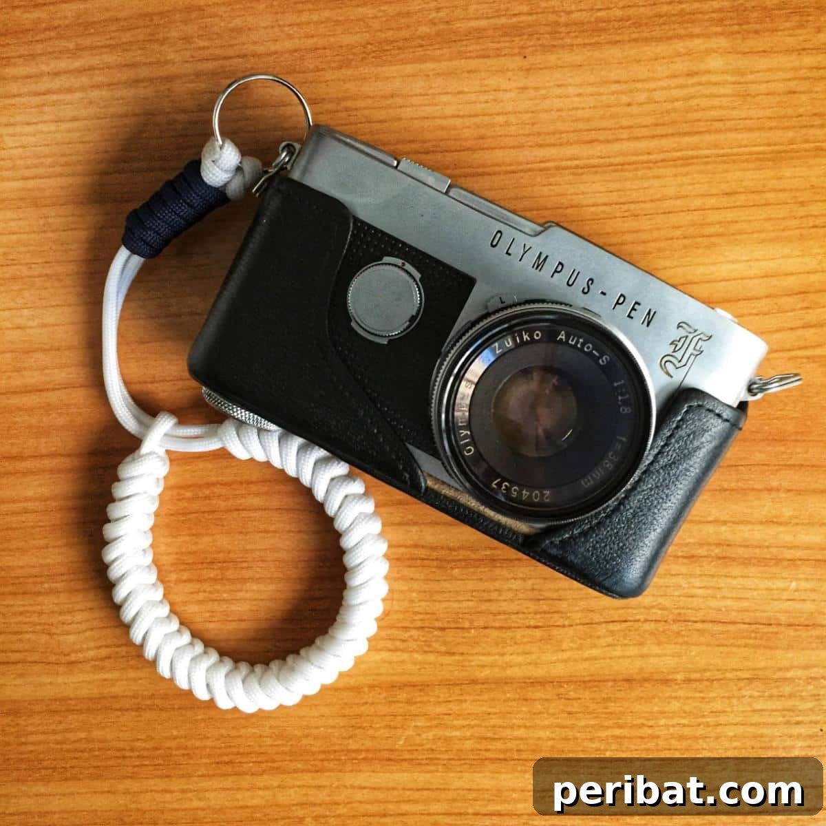 Crafting with Paracord: DIY Ideas and Projects 24 Adjustable Paracord Snake Knot Camera Strap for secure handling.