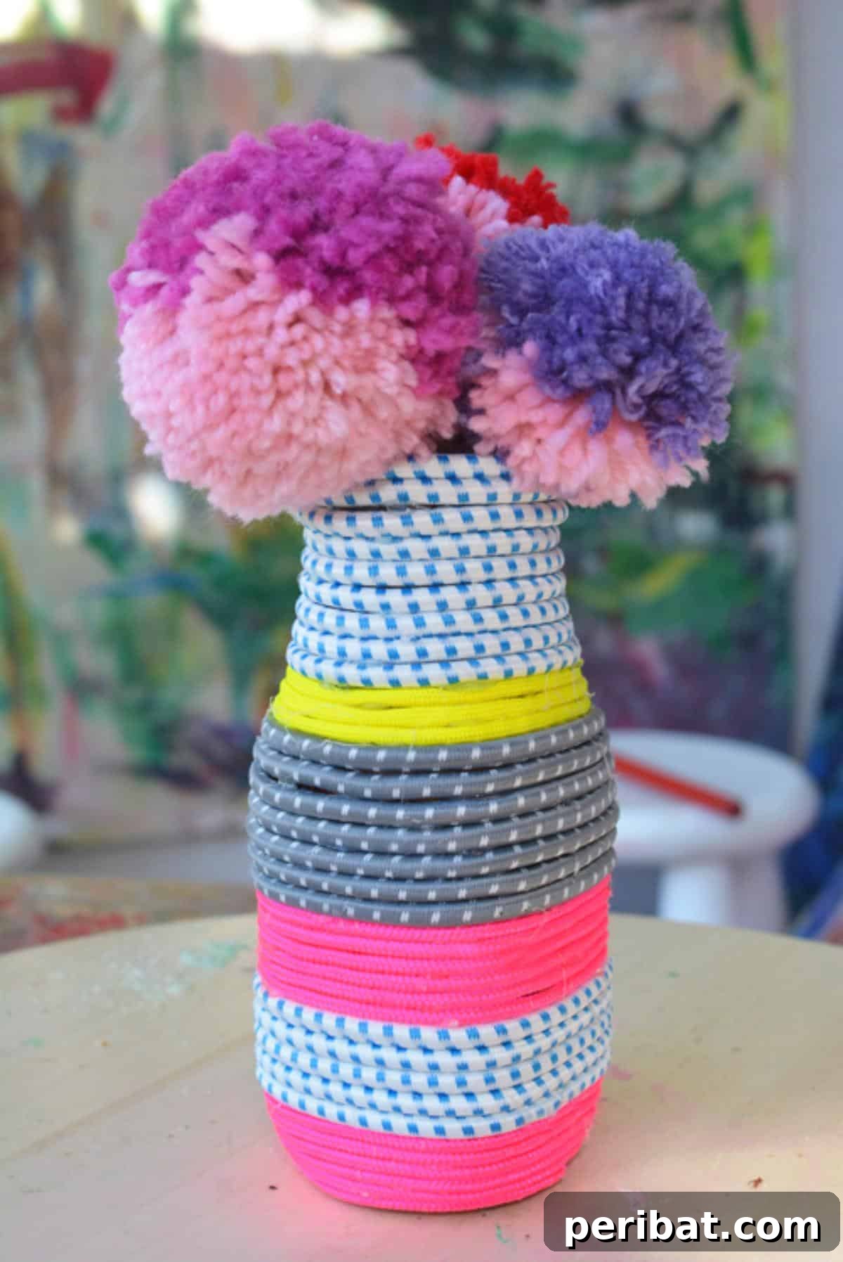 Crafting with Paracord: DIY Ideas and Projects 27 Decorative DIY Parachute Cord Vase, inspired by African artistry.