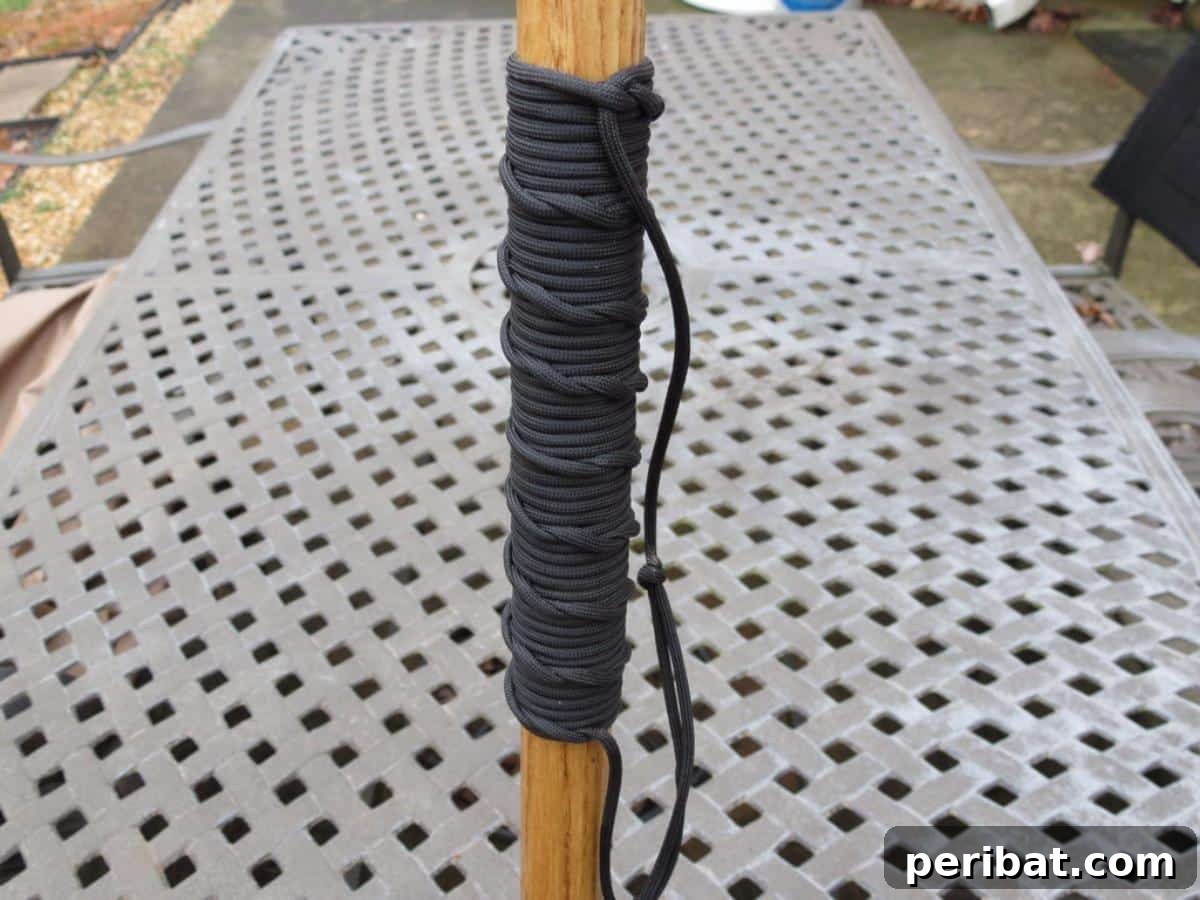 Crafting with Paracord: DIY Ideas and Projects 6 Hiking Stick with a decorative and functional Paracord Wrap.